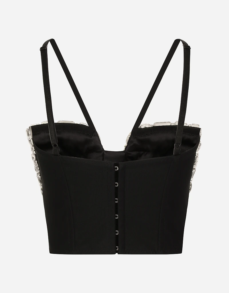 Corset top with rhinestone embellishment