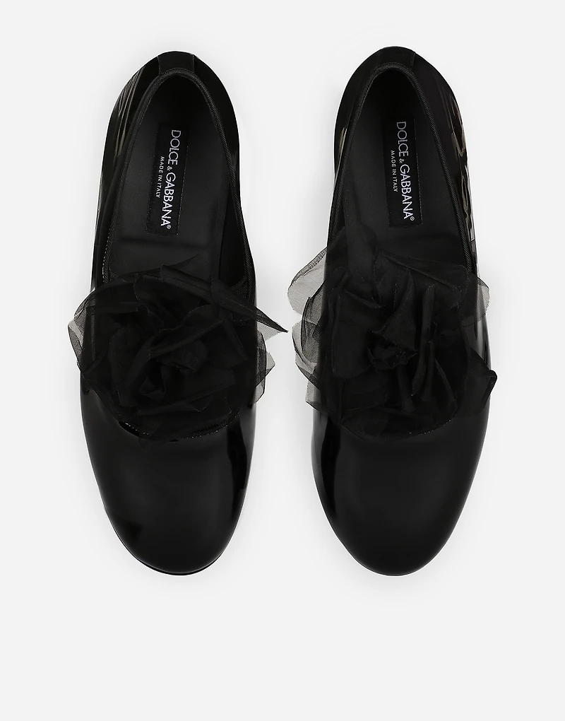Patent leather slippers with flower appliqué