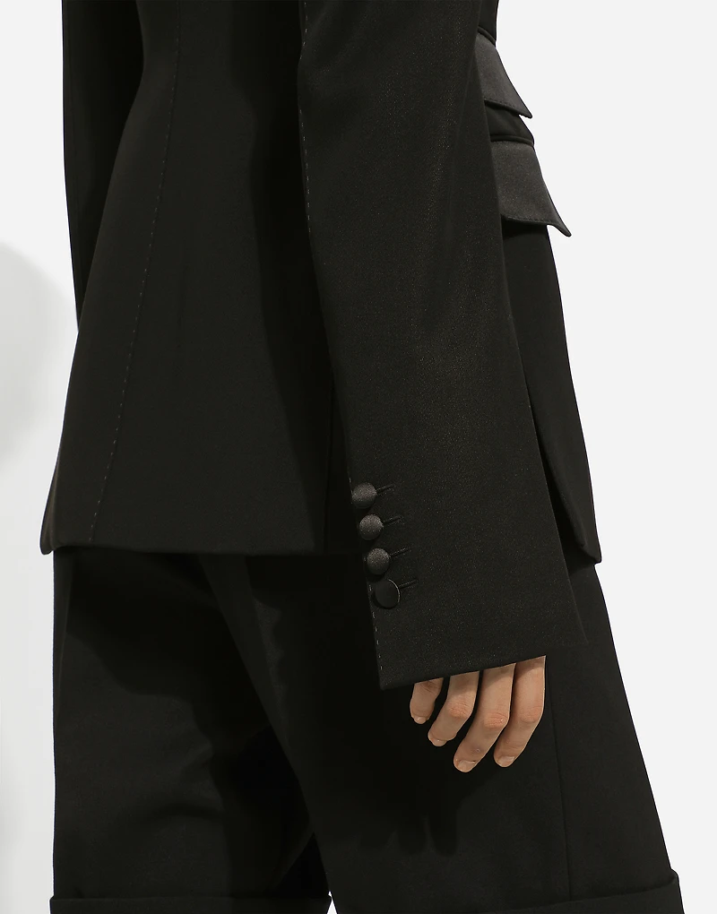 Double-breasted woolen jacket with side vents