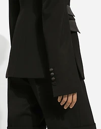 Double-breasted woolen jacket with side vents