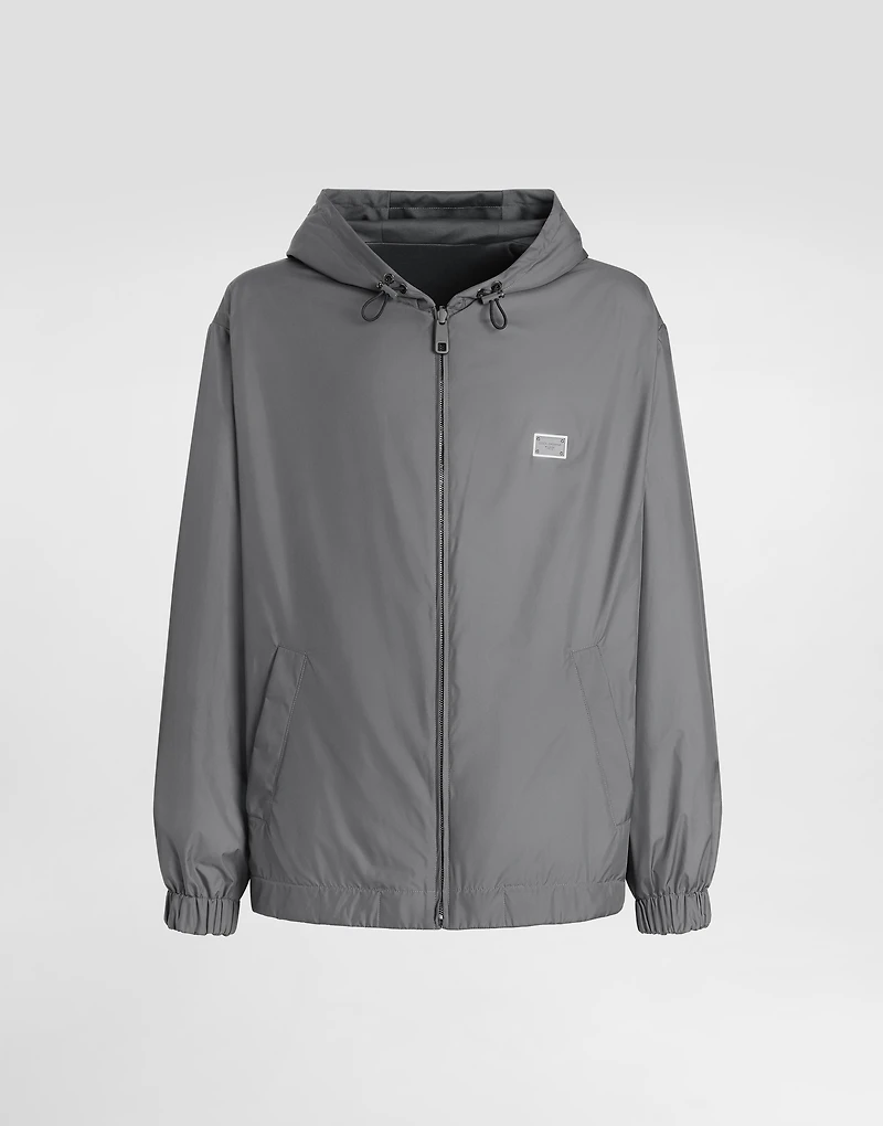 Technical fabric sports jacket with hood