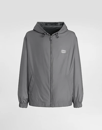 Technical fabric sports jacket with hood