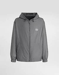 Technical fabric sports jacket with hood