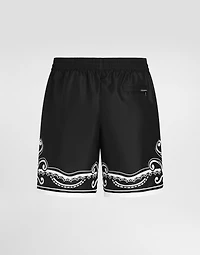 Mid-length swim trunks with bandanna print