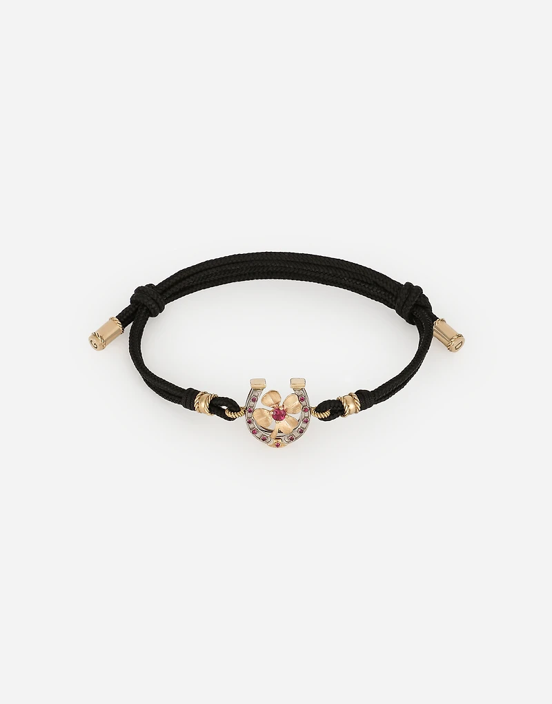 Good Luck Bracelet fabric with a pendant in 18 carat yellow gold
