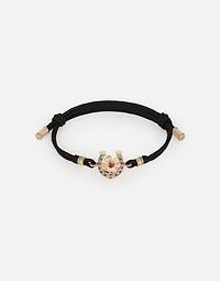  Good Luck Bracelet fabric with a pendant in 18 carat yellow gold