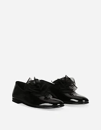 Patent leather slippers with flower appliqué