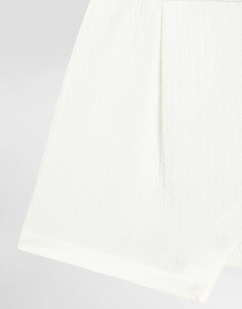 Interlock and piqué romper suit with diamond stitch detailing