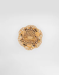 Metal brooch with rhinestones
