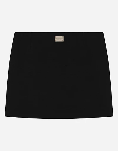 Viscose miniskirt with logo tag