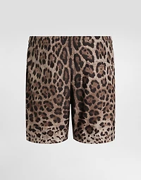 Mid-length swim trunks with leopard print