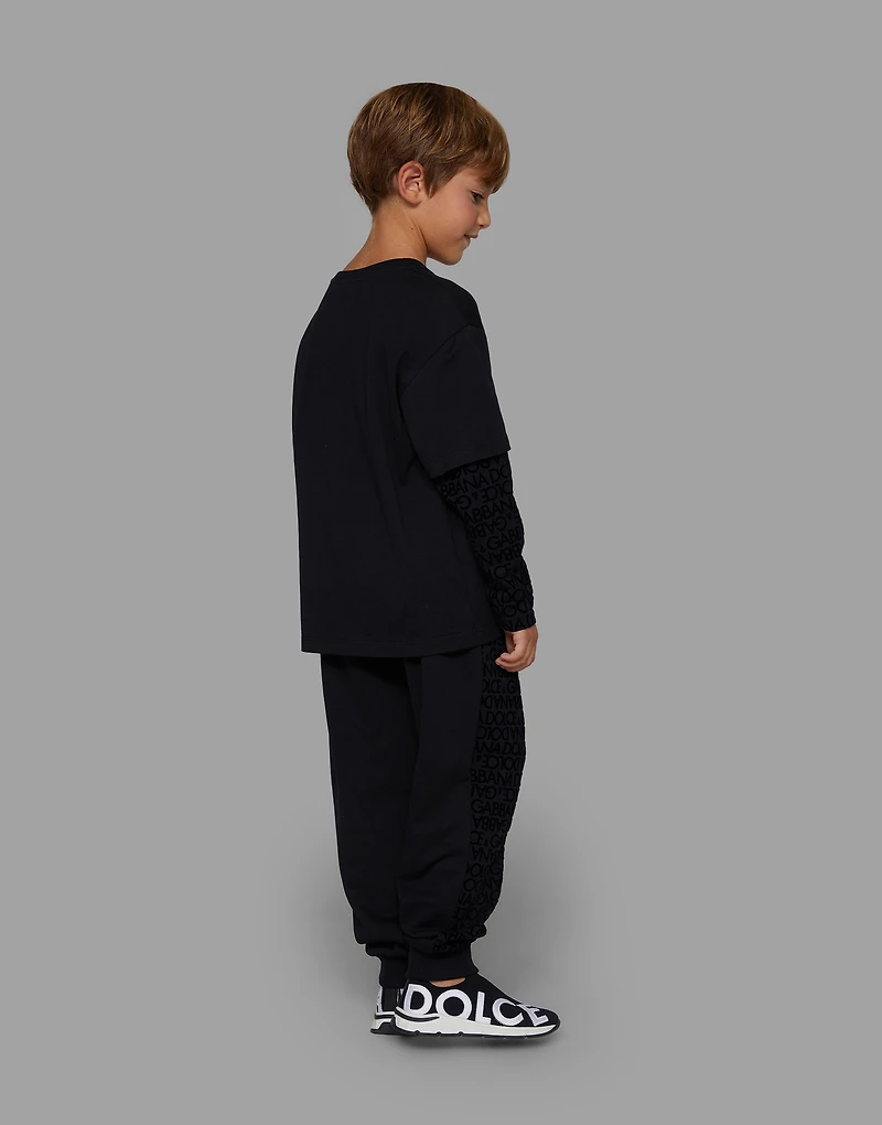 Jersey jogging pants with all-over flocked print
