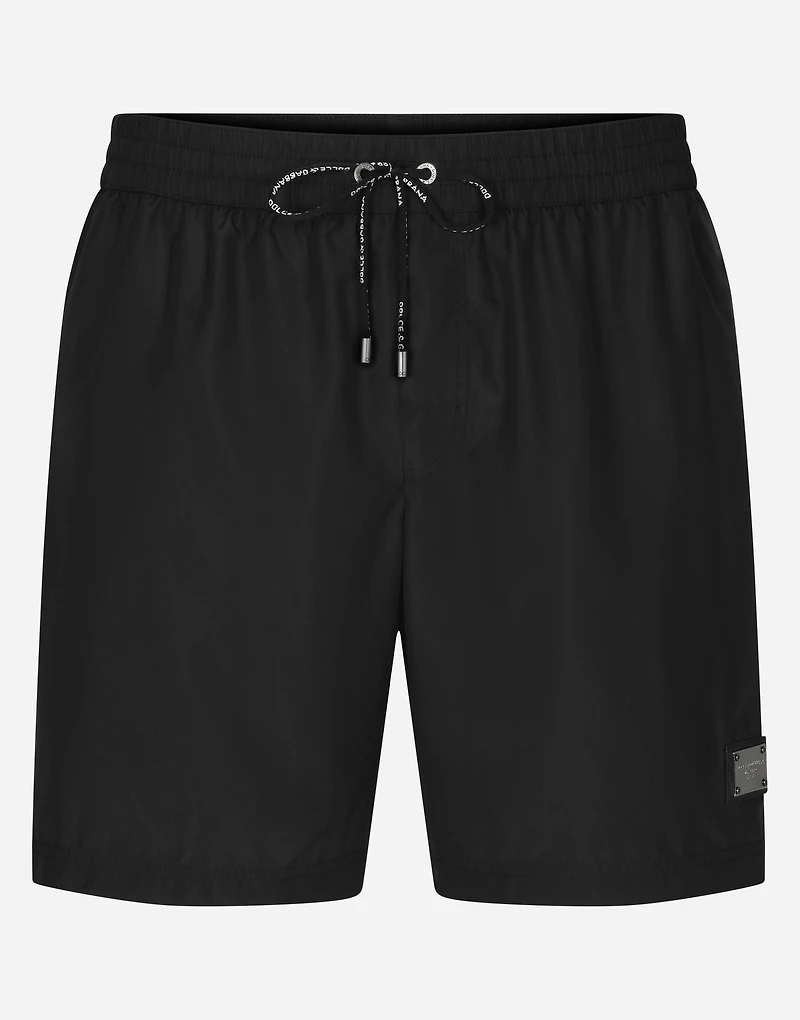 Mid-length swim trunks with branded plate