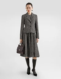 Sleeveless dress with chevron print