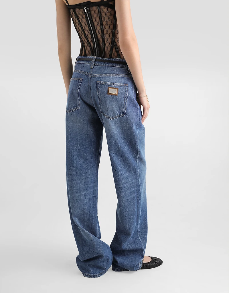 Loose denim jeans with pressed pleat