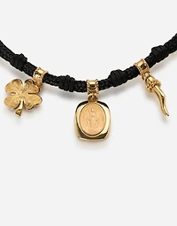 Good Luck Bracelet fabric with a pendant in 18 carat yellow and red gold