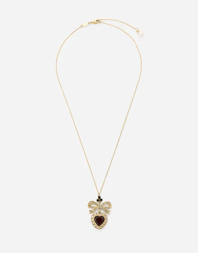 Devotion Pendant 18 carat yellow gold, red garnet and gray sapphires