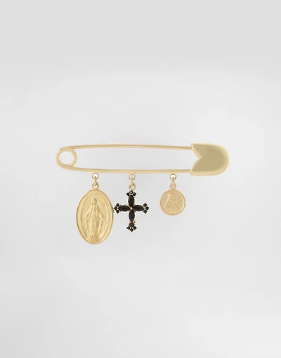 Safety brooch with cross and medals