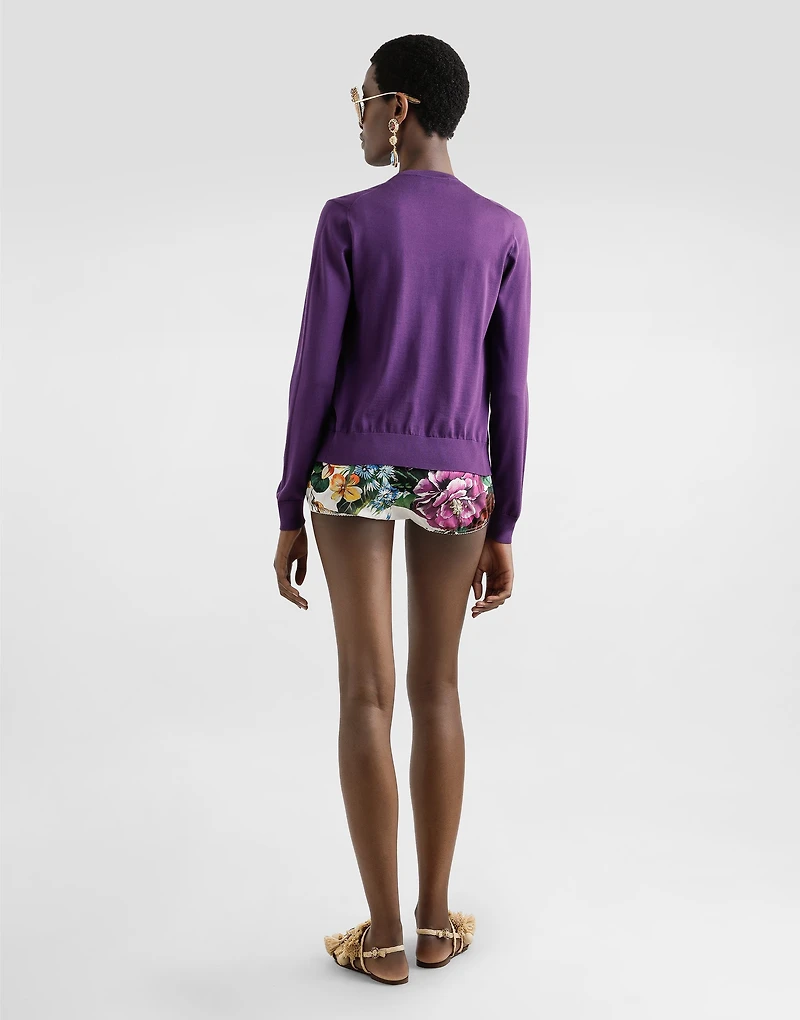 Silk cardigan with flower brooch