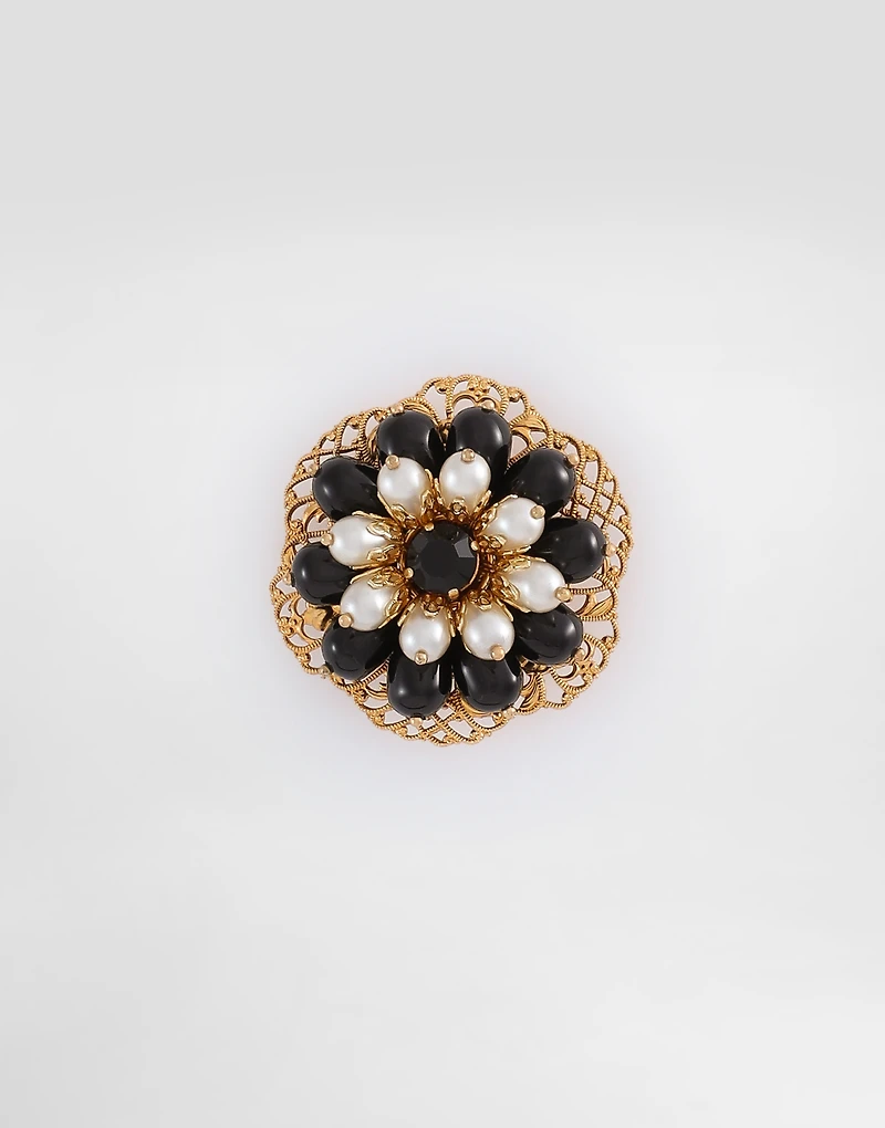 Metal brooch with rhinestones