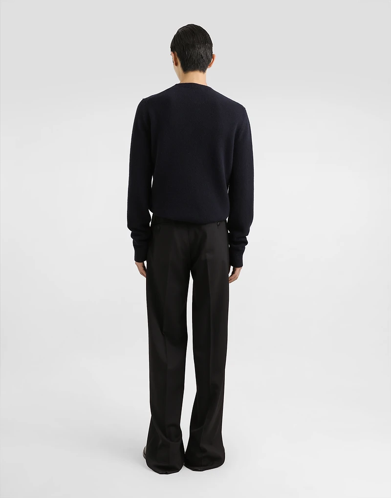 Wool round-neck sweater with bejeweled buttons