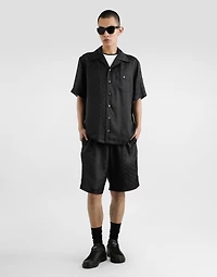 DG logo jacquard trousers