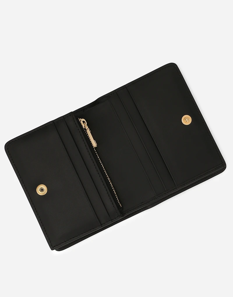 Polished calfskin wallet with leopard print