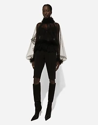 Tulle blouse with ruffles on the neck and cuffs
