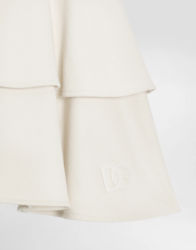Fleece skirt with laser-cut DG logo