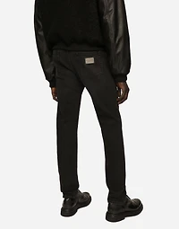 Slim fit stretch denim jeans with subtle abrasions