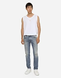 Light blue skinny stretch jeans with rips