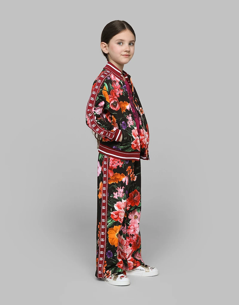 Jersey sweatshirt with floral print over a black background