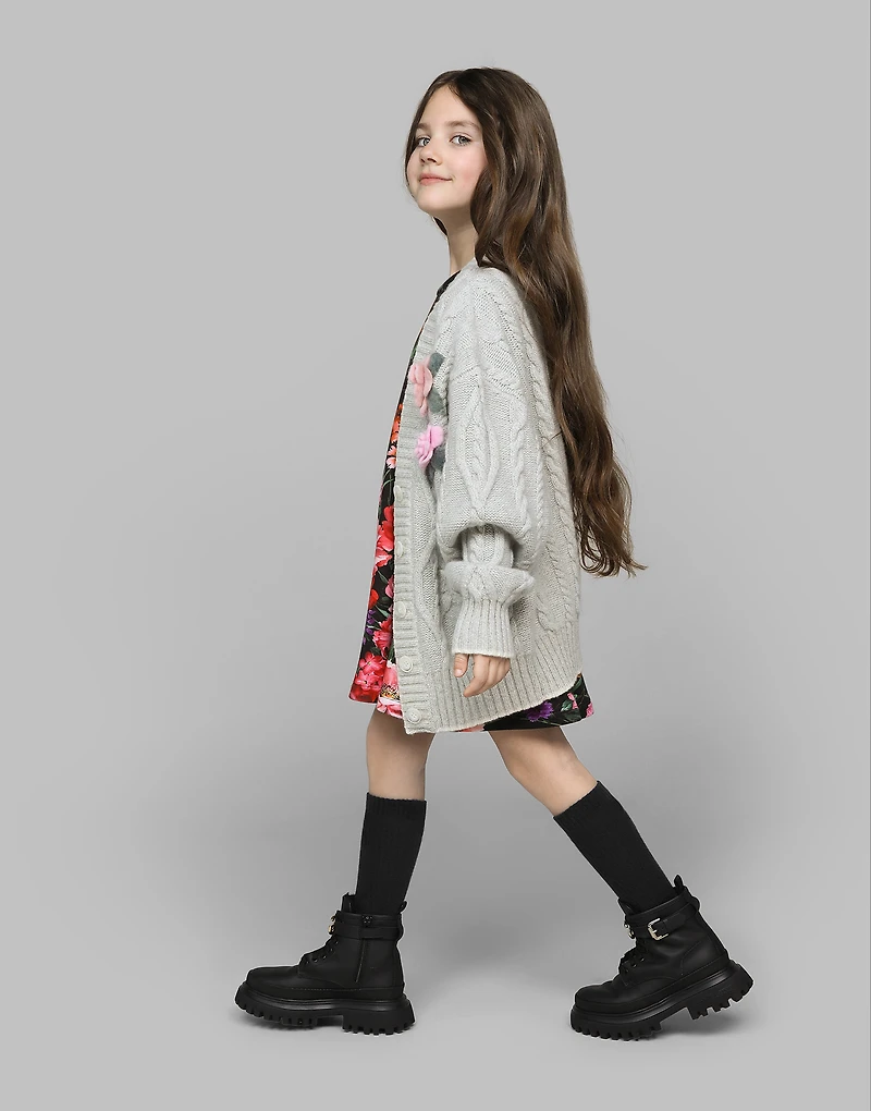 Neoprene dress with floral print over a black background