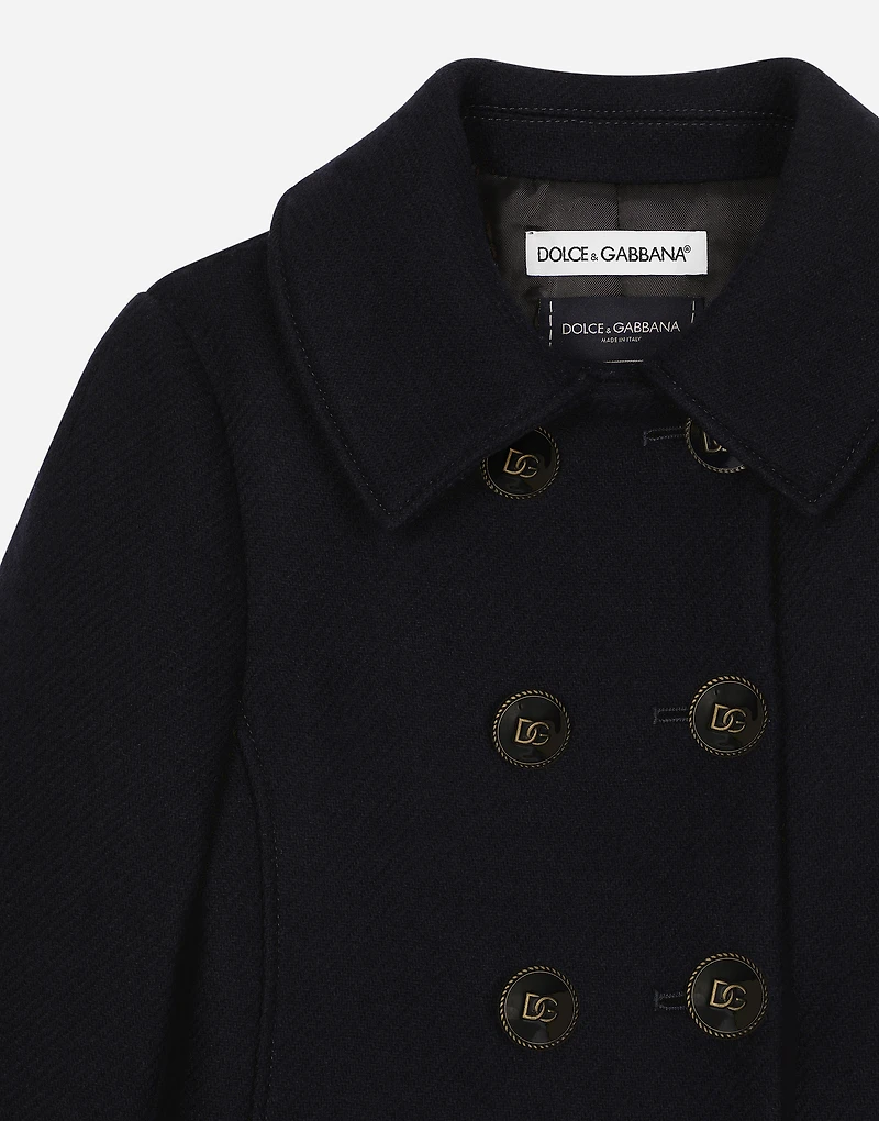 Double-breasted wool coat with branded buttons