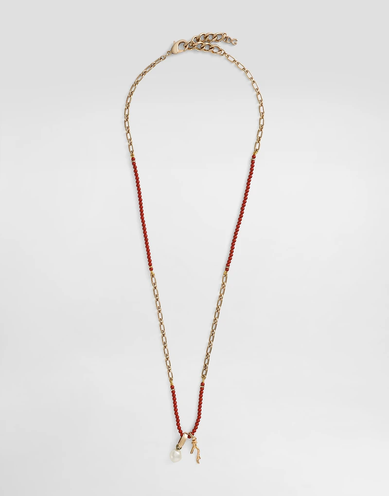 Metal necklace with gemstones and charms