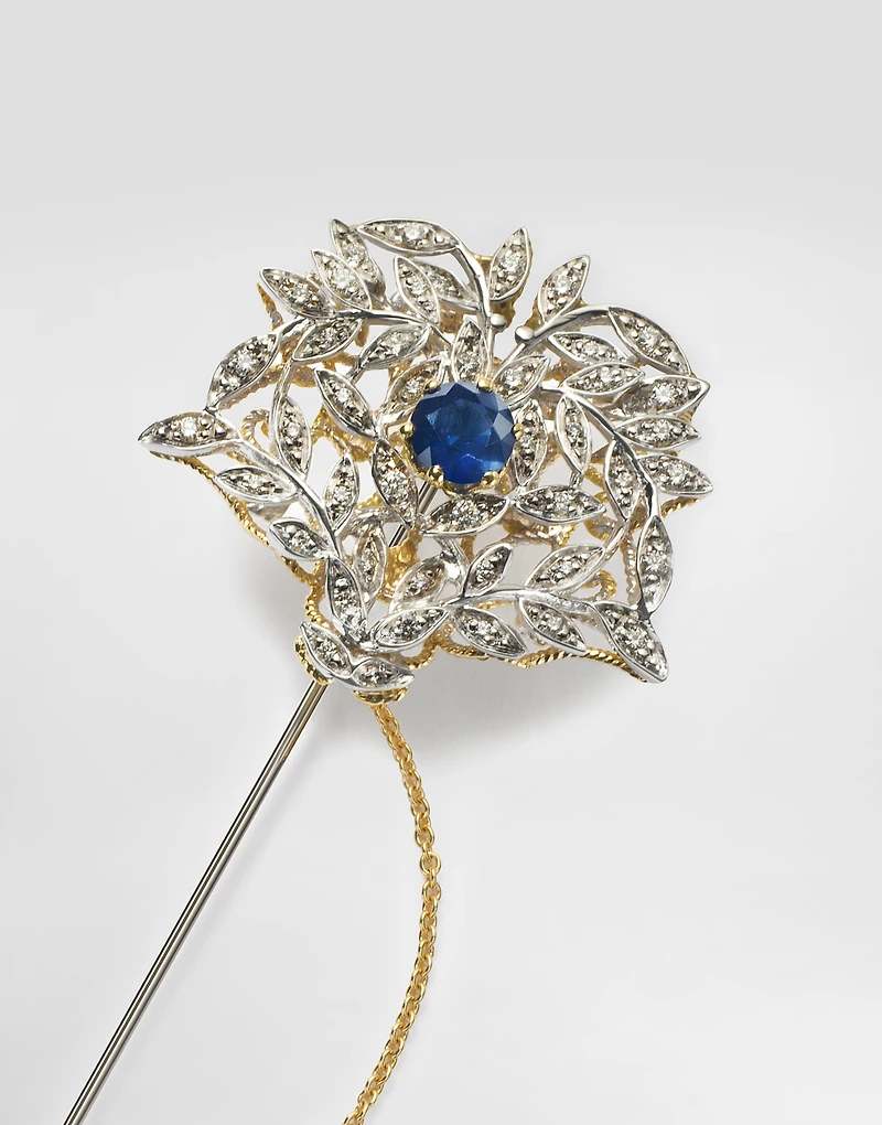 Sicily Brooch  18-carat yellow and white gold, blue sapphires, and diamonds