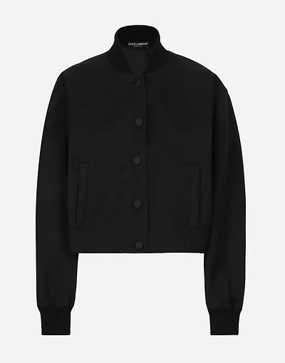 Gabardine bomber jacket, waxed on reverse, with branded tag