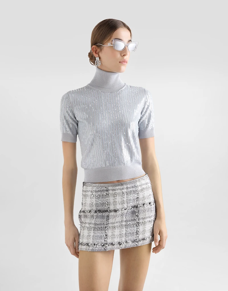 Turtle-neck sweater with sequin embroidery