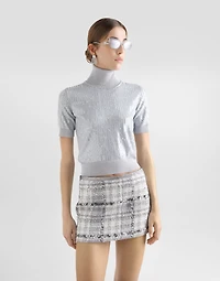 Turtle-neck sweater with sequin embroidery