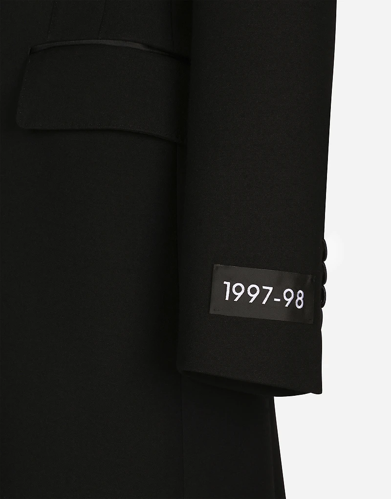 Long single-breasted wool tuxedo coat