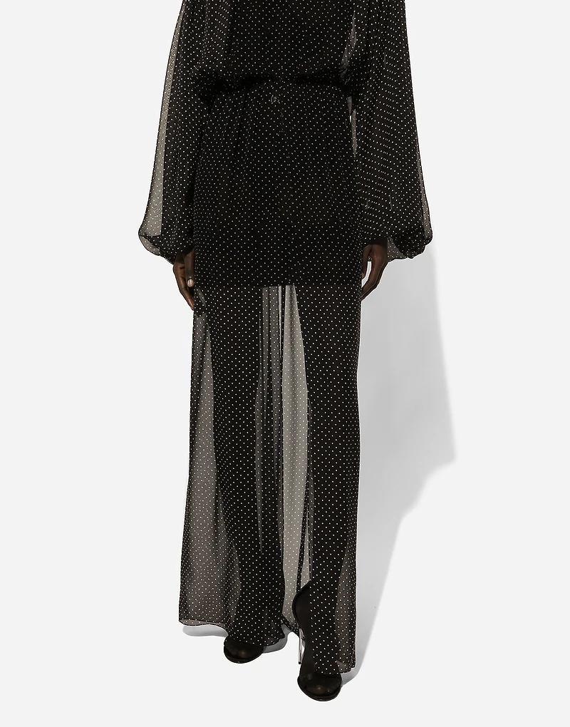 Long silk chiffon dress with polka-dot print, a pussy-bow detail and flower on neck