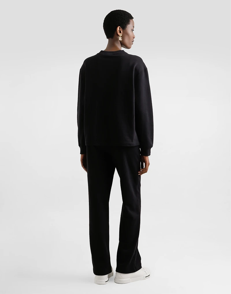 Fleece jogging pants with patch