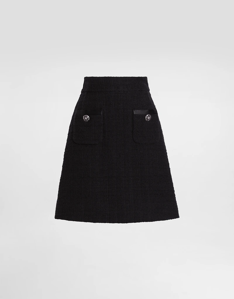 Short raschel tweed A-line skirt with bejeweled buttons