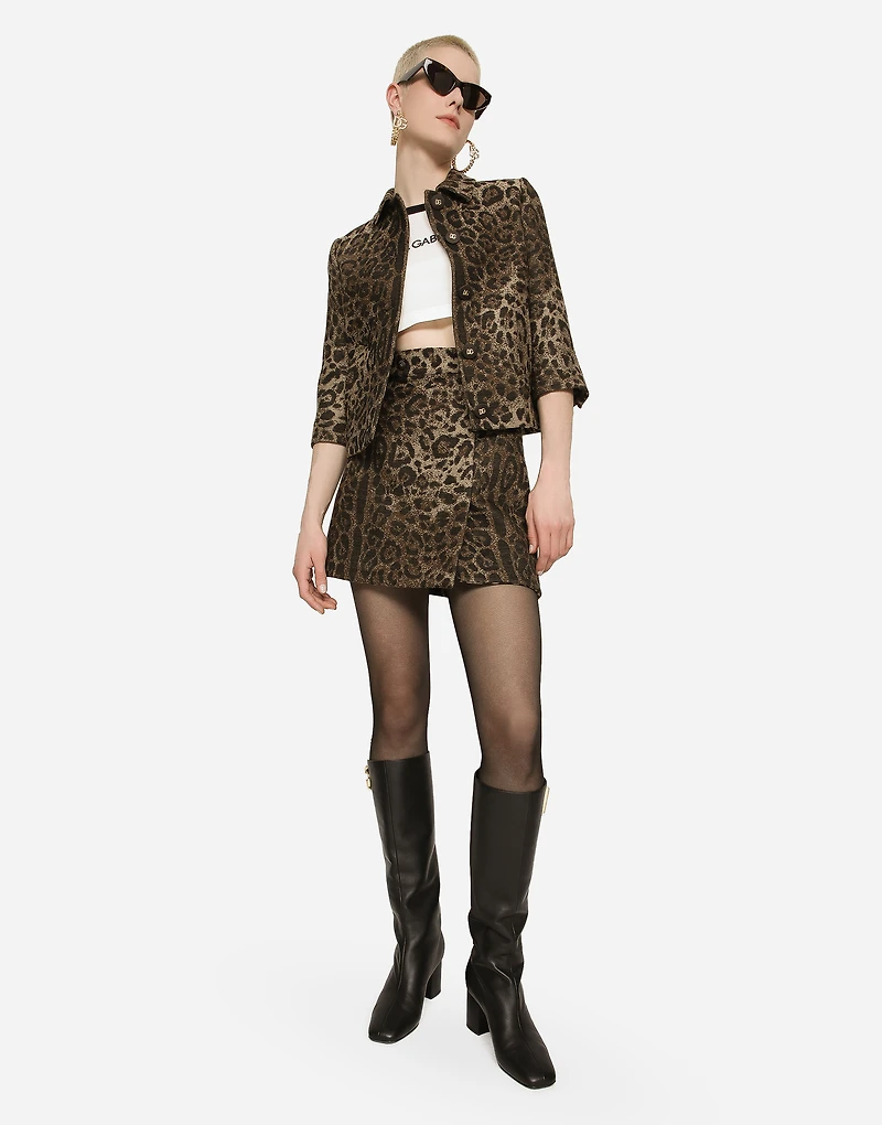 Short wool skirt with jacquard leopard design