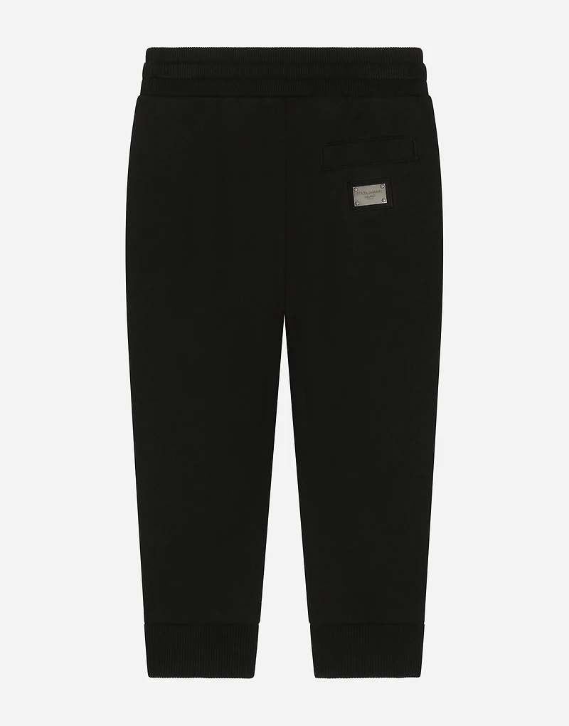 Fleece trousers with DG logo plaque