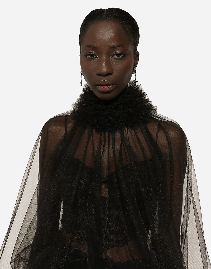 Tulle blouse with ruffles on the neck and cuffs