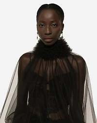 Tulle blouse with ruffles on the neck and cuffs