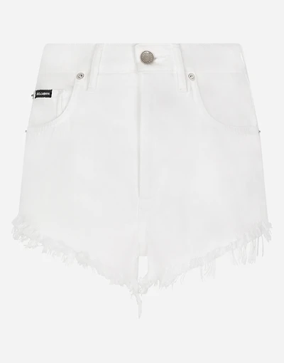Denim shorts with ripped details and abrasions