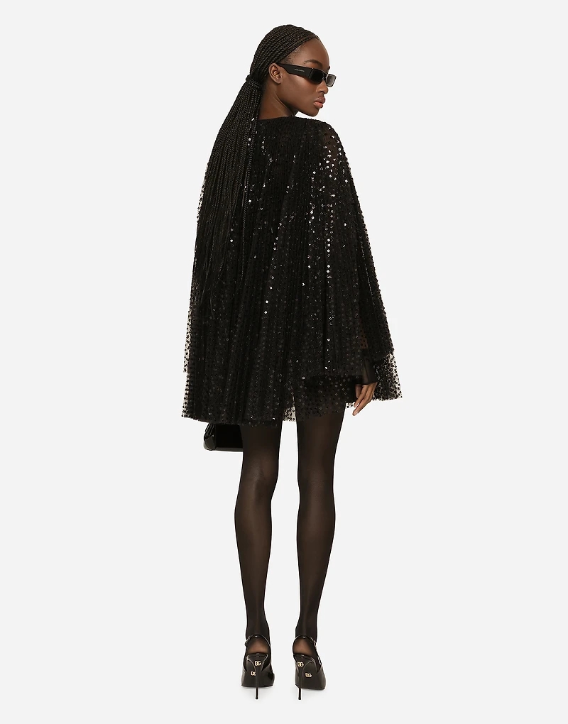 Short pleated dress with full sequined sleeves