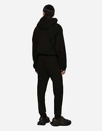 Jersey jogging pants with embroidery